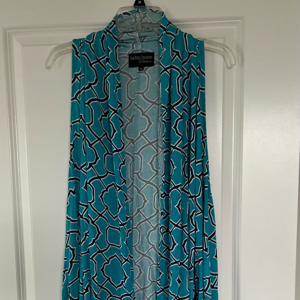 Teal vest. Long, versatile.